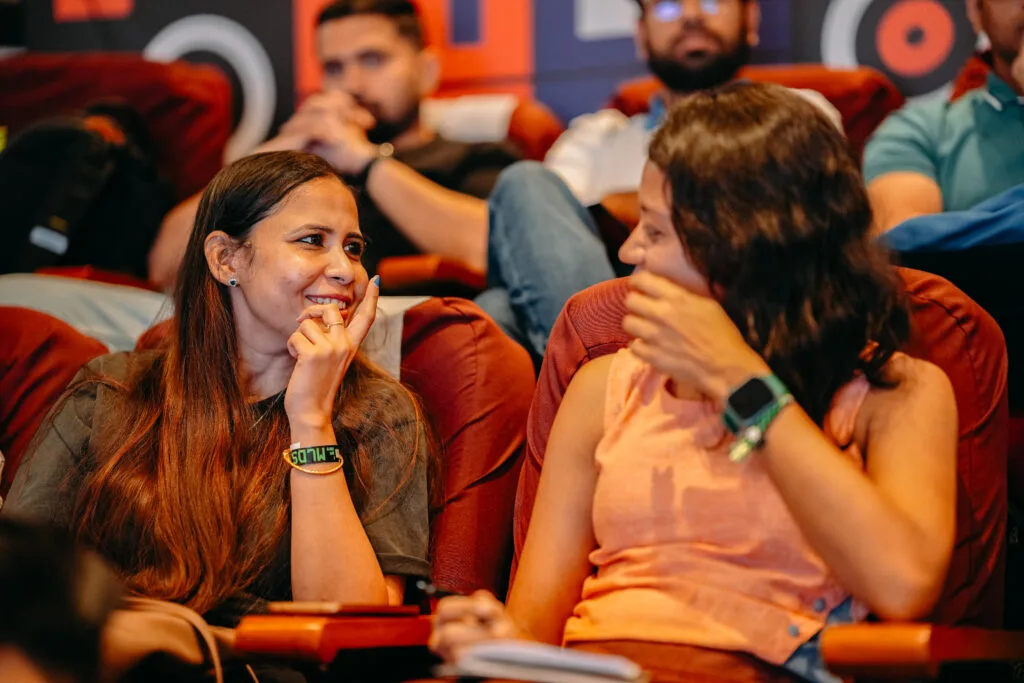 Developers in conversation during an MLDS session